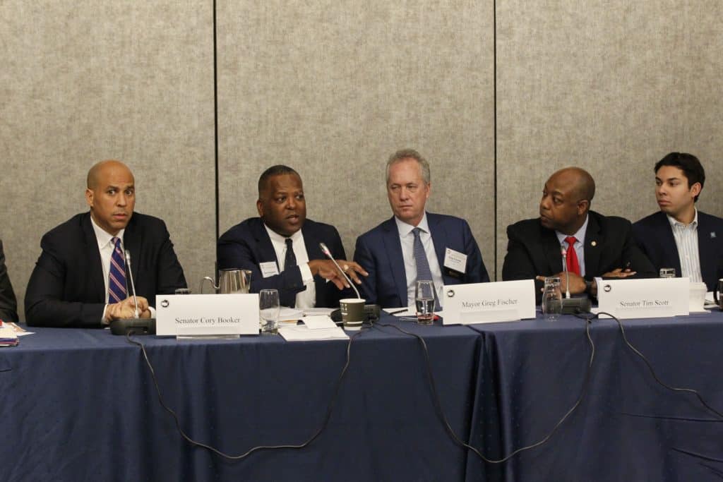 US Mayors 86th Winter Meeting Senator Cory Booker (D-NJ) and Senator Tim Scott (R-SC) discuss opportunity zones at the 86th Winter Meeting on January 24, 2018.
